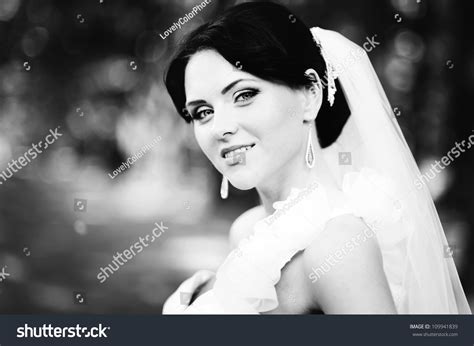 Close Up Portrait Of A Pretty Shy Bride Stock Photo 109941839