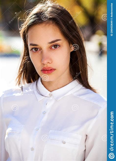 Close Up Portrait Of A Young Brunette Girl In White Shirt Stock Image Image Of Lifestyle Calm