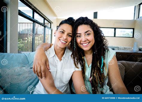 Portrait Of Happy Lesbian Couple Embracing Each Other And Smiling Stock