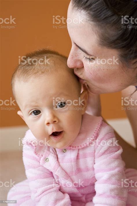 Mom Kissing Baby Girl Stock Photo Download Image Now 0 11 Months