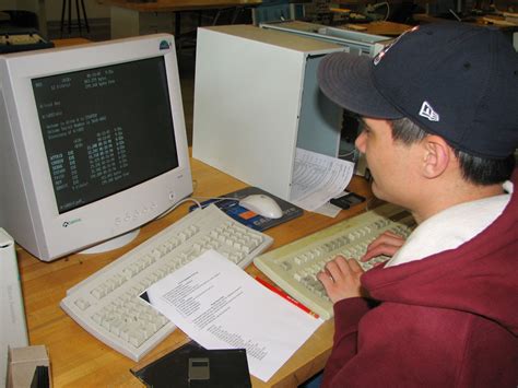 Learn about basic computer science concepts like algorithms, binary, programming languages, and more. Computer Science | Student working in a computer science ...