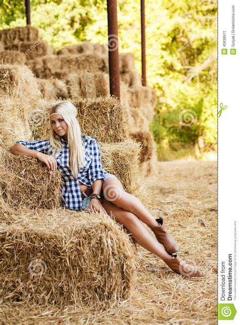 Sexy Blonde Woman Resting On Hay In Rural Areas Stock Photo Image