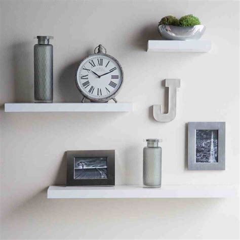 Who says floating shelves have to be boring. White Floating Wall Shelves - Decor Ideas