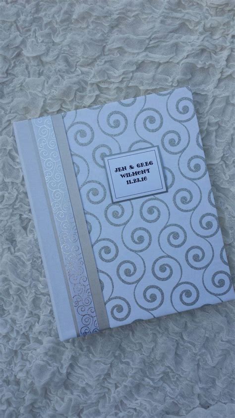 Classy black or white albums are one favourite option, as well as personalised, handmade paper portfolios. Contemporary Wedding Photo Album Personalized Album 8x10 | Etsy | Wedding photo albums, White ...