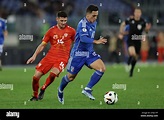 Bojan Dimoski of North Macedonia challenges for the ball with Giacomo ...