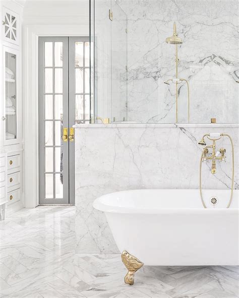 I decided to go ahead and tile all the way around the cabinets. 10 Gorgeous Way to Use White Marble Tile For Bathroom ...
