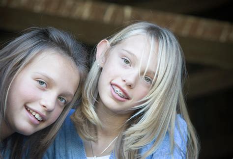 Two Young Girls Smiling At The Camera Photograph By Ron Koeberer Pixels