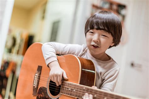 Boy Playing Guitar Stock Photo Download Image Now Acoustic Music