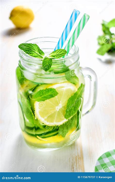 Detox Water Infused With Sliced Lemon Cucumber And Mint Stock Image