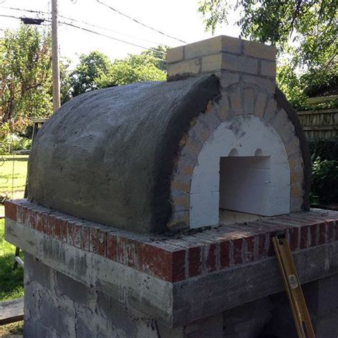 Outdoor Diy Wood Fired Brick Pizza Oven With Colored Stucco And Stone