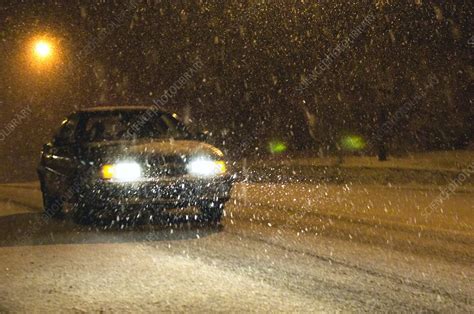 Car Driving Through Heavy Snow Stock Image C0019895