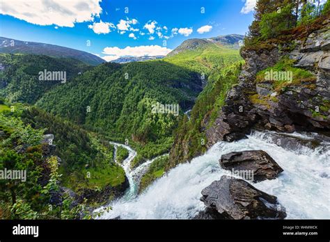 A Wild And Impressive Norwegian Landscape With Mountains Rivers