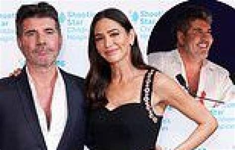 simon cowell engaged to lauren silverman after proposing on barbados holiday
