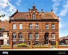 Bartoszyce, Polen - 13. Juli 2022: Gotisches Pfarrhaus der ...