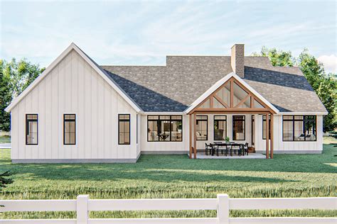Modern Farmhouse Plan With Cathedral Ceiling In The Great Room And