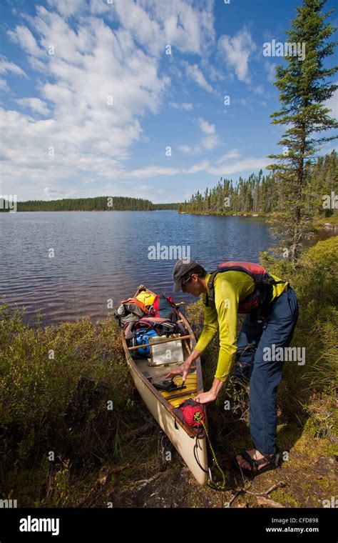 A Young Man Canoeing And Camping For 2 Weeks In Wabakimi Provincial