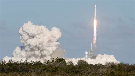 Falcon Heavy In A Roar Of Thunder Carries Spacexs Ambition Into