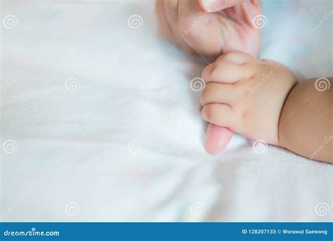 Baby Hand On The Bed Soft Focus Newborn Tiny Hand Children Hand
