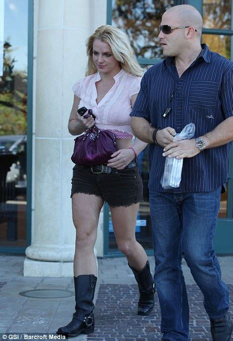 Britney Spears Takes The Shears To Her Outfit As She Steps Out In Cut