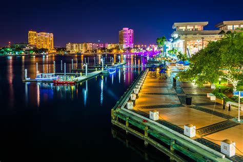 View Of The Riverwalk At Night In Tampa Florida Leading Roofing