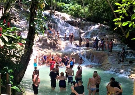 Dunns River Falls And Jungle River Tubing Adventure Tour From Montego