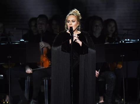 adele was swiftly mocked after wearing bantu knots and a jamaican flag bikini in an instagram