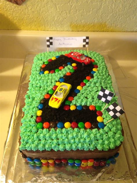 The cake itself was double chocolate with a cookies and cream filling. Easy DIY cars birthday cake for boys. Use M&Ms and crushed ...