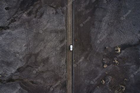 Premium Photo Black Volcanic Desert On Wilderness With 4x4 Vehicle