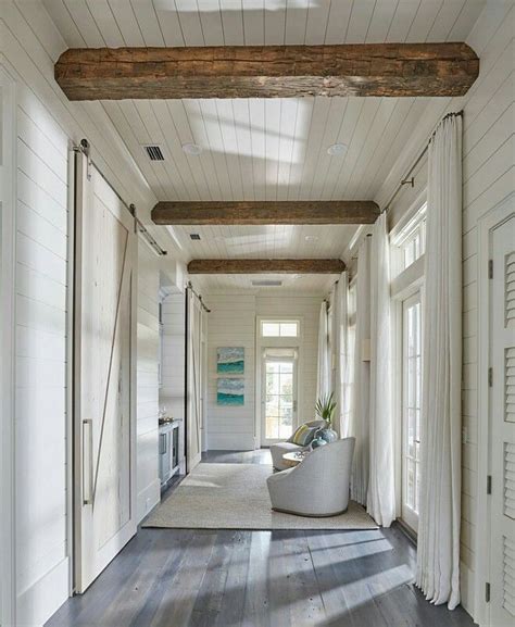 This Hallway Boasts Rustic Wood Beam Ceiling Shiplap Walls Shiplap