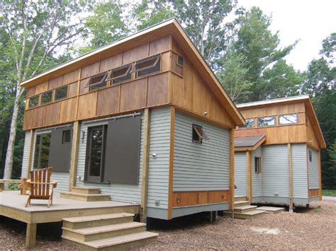 Compact Modular Pre Fab Cottage Made From Local Materials Sits Amongst