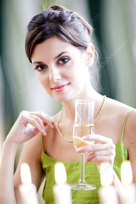 Woman Drinking Champagne Stock Image C032 6211 Science Photo Library