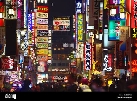 Night Scene Of Street Signs And Lights In Shinjuku Tokyo Japan Stock