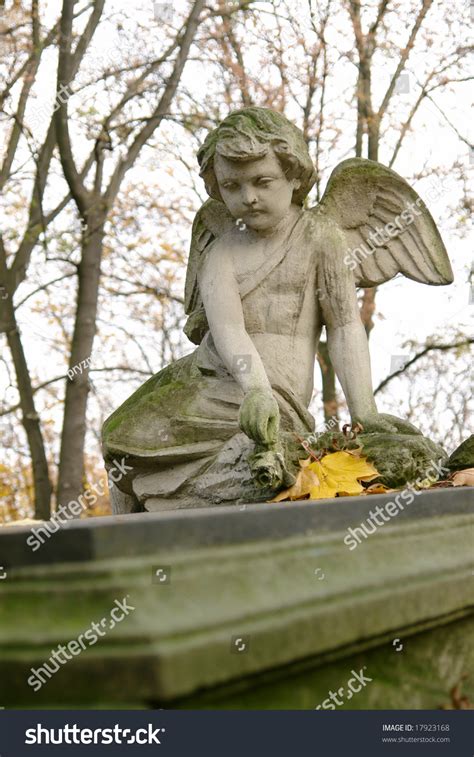 Stone Mourning Angel Statue Sitting On Stock Photo 17923168 Shutterstock