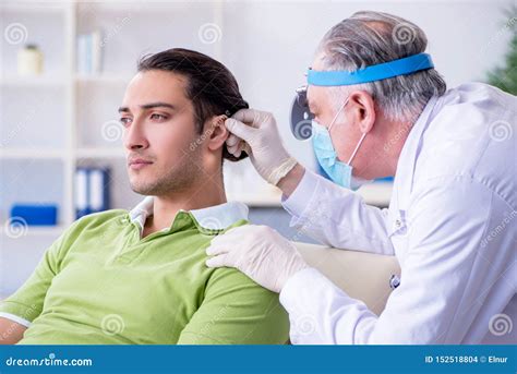 Male Patient Visiting Doctor Otolaryngologist Stock Photo Image Of