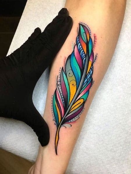 25 Feather Tattoo Designs And Meaning 2023 The Trend Spotter