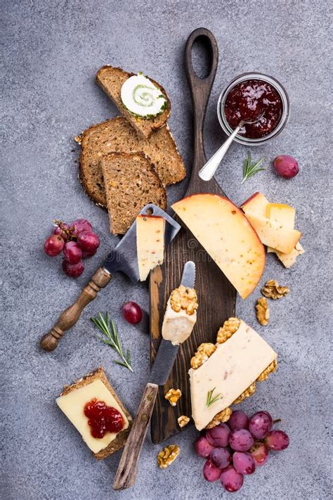 Assorted Cheeses On Wooden Board Stock Image Image Of Background Delicatessen 102964359