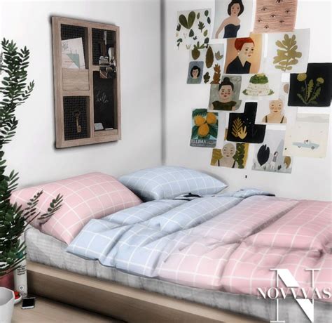 A Bed Sitting In A Bedroom Next To A Plant