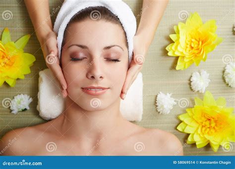 Beautiful Young Woman Lying Relaxed In A Spa Salon Stock Photo Image