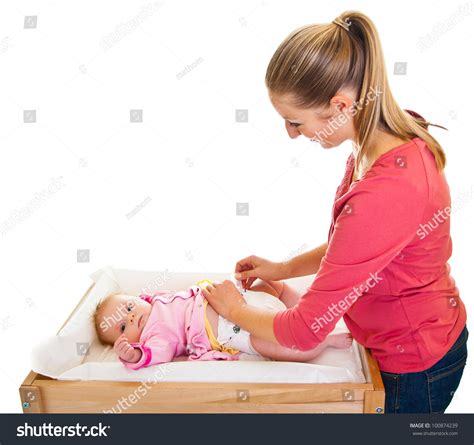 Mother Changing Little Girls Diaper On Stock Photo Edit Now 100874239