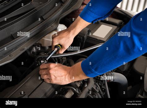 Mechanic Repairing Car Stock Photo Alamy