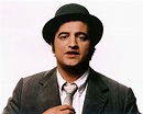 Why is John Belushi so influential in comedy?