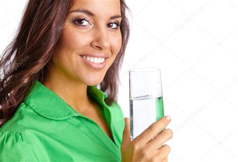 Woman Holding Glass Of Water Stock Photo By ©pressmaster 74089749