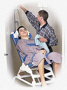 Also, if your chair is like mine, you need to be on your knees to best reach your child. A young man in shower in a Rifton Blue Wave Bath Chair ...