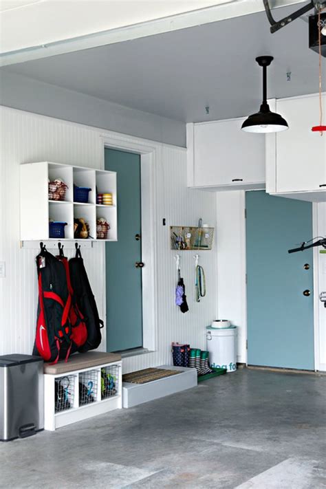 If you already have a garage that opens into the house, consider framing out a short section of wall to convert part of the garage into a mudroom. Garage Mudroom Ideas and Inspiration | Hunker
