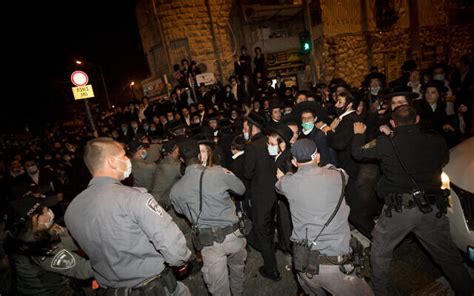 25 arrested after clashes at huge ultra orthodox protest in jerusalem the times of israel