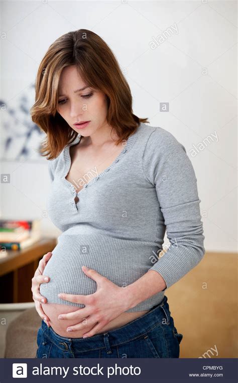 Free for commercial use high quality images PREGNANT WOMAN, CONTRACTION Stock Photo - Alamy