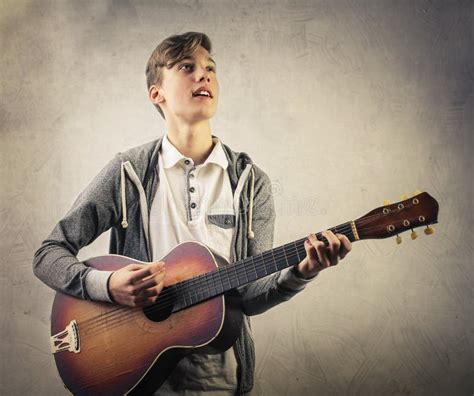 Boy With Guitar Stock Image Image Of Instrumental Guitar 71278857