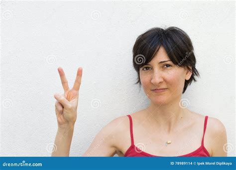 Young Woman Making A Peace Sign Stock Photo Image Of Emotion Adult