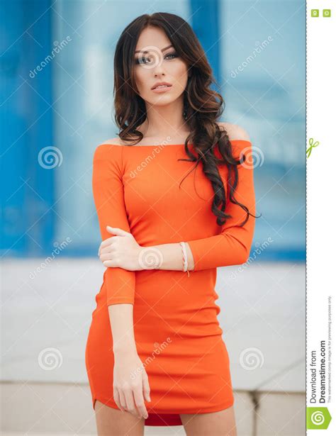 Pretty Woman With Brown Eyes Posing On A Background Of The City Stock