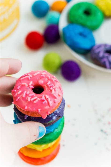 A Rainbow Colored Baked Donut Recipe How To Make Rainbow Donuts